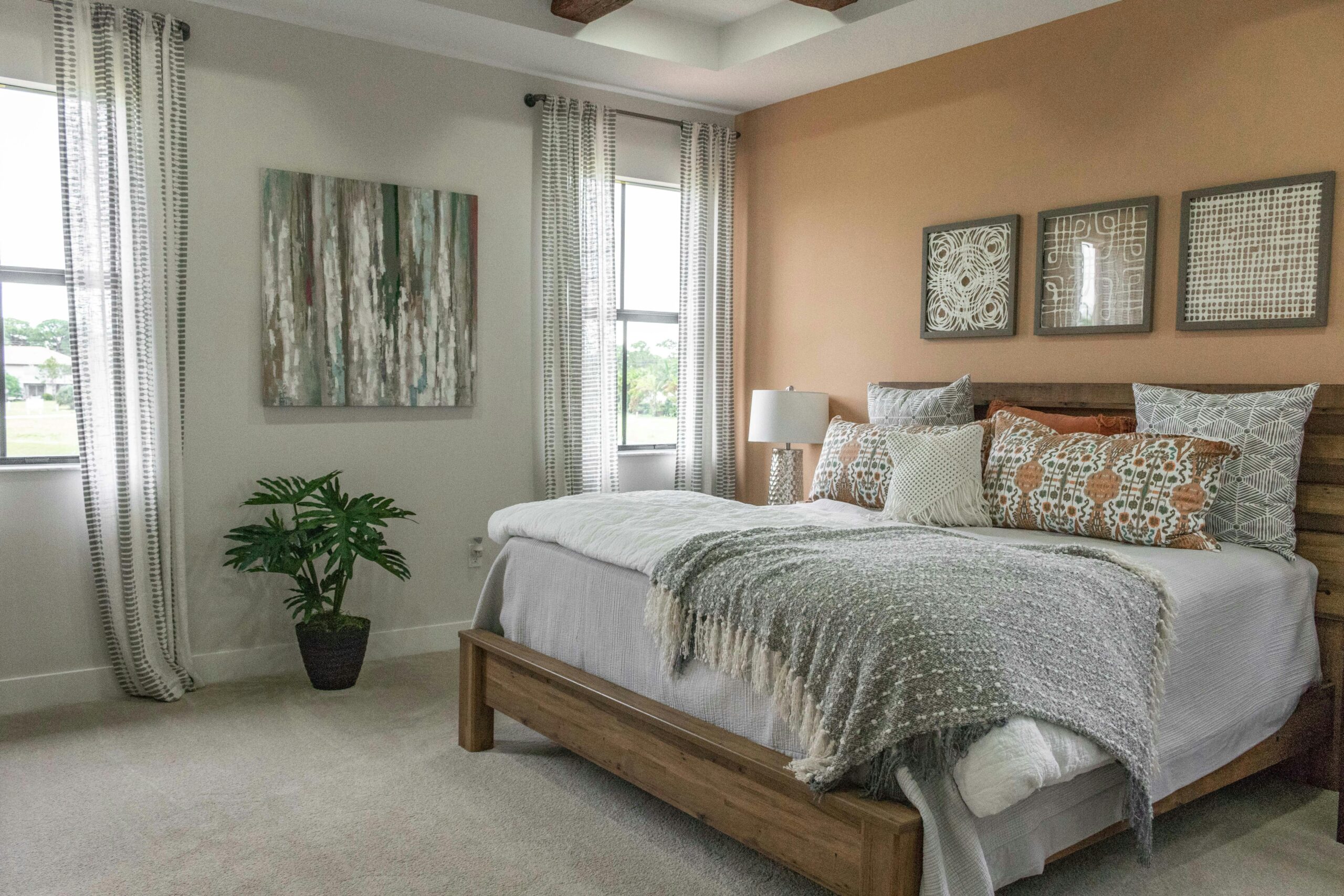 A bright and stylish bedroom with contemporary decor and natural light.